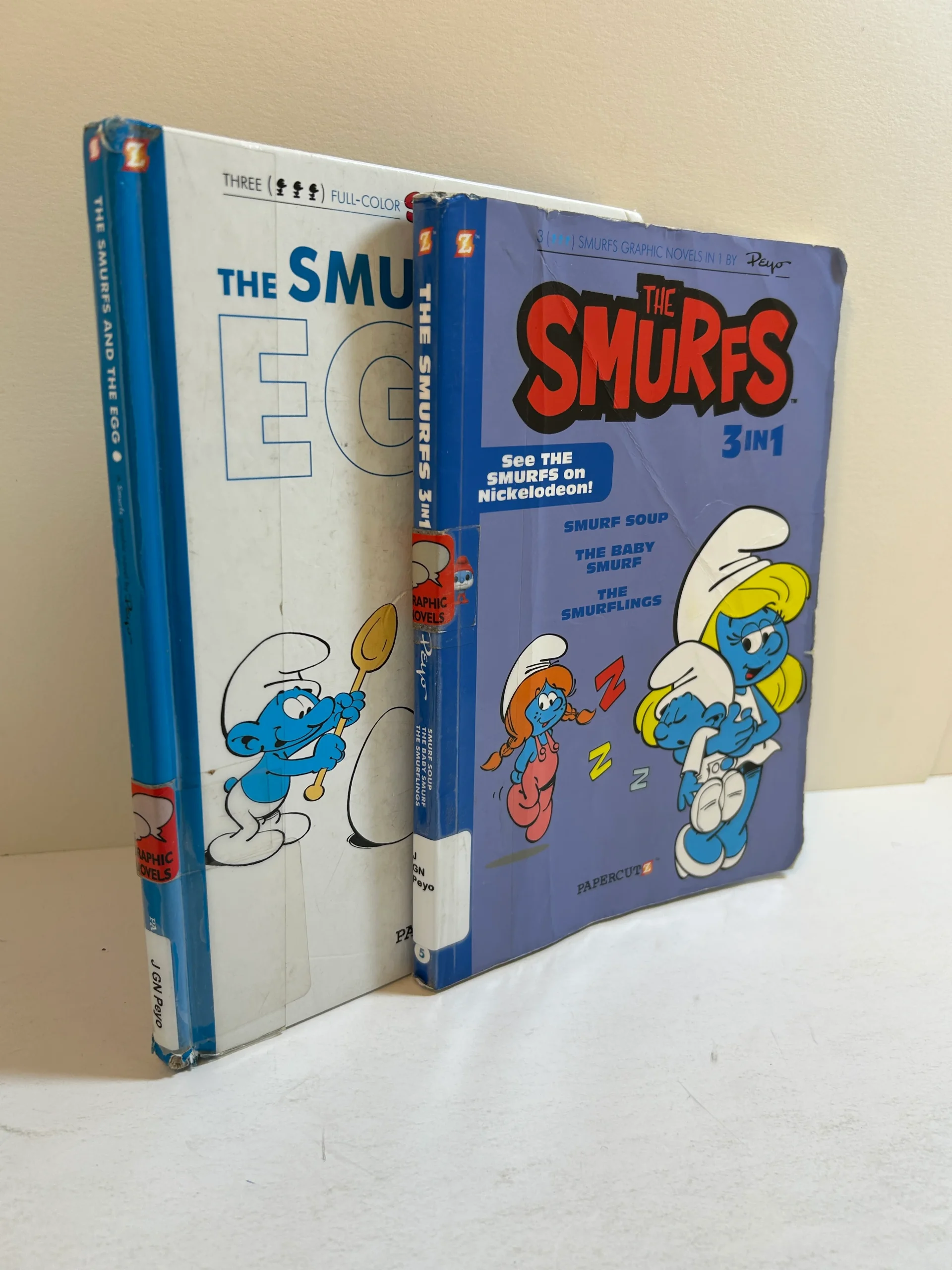 2-vol-smurfs-graphic-novelss-the-egg3in1-s-soupthe-baby-ssmurflings-ex-lib.webp 2 Vol Smurfs Graphic Novels:S & the Egg/3in1 S Soup/The Baby S/Smurflings Ex-Lib