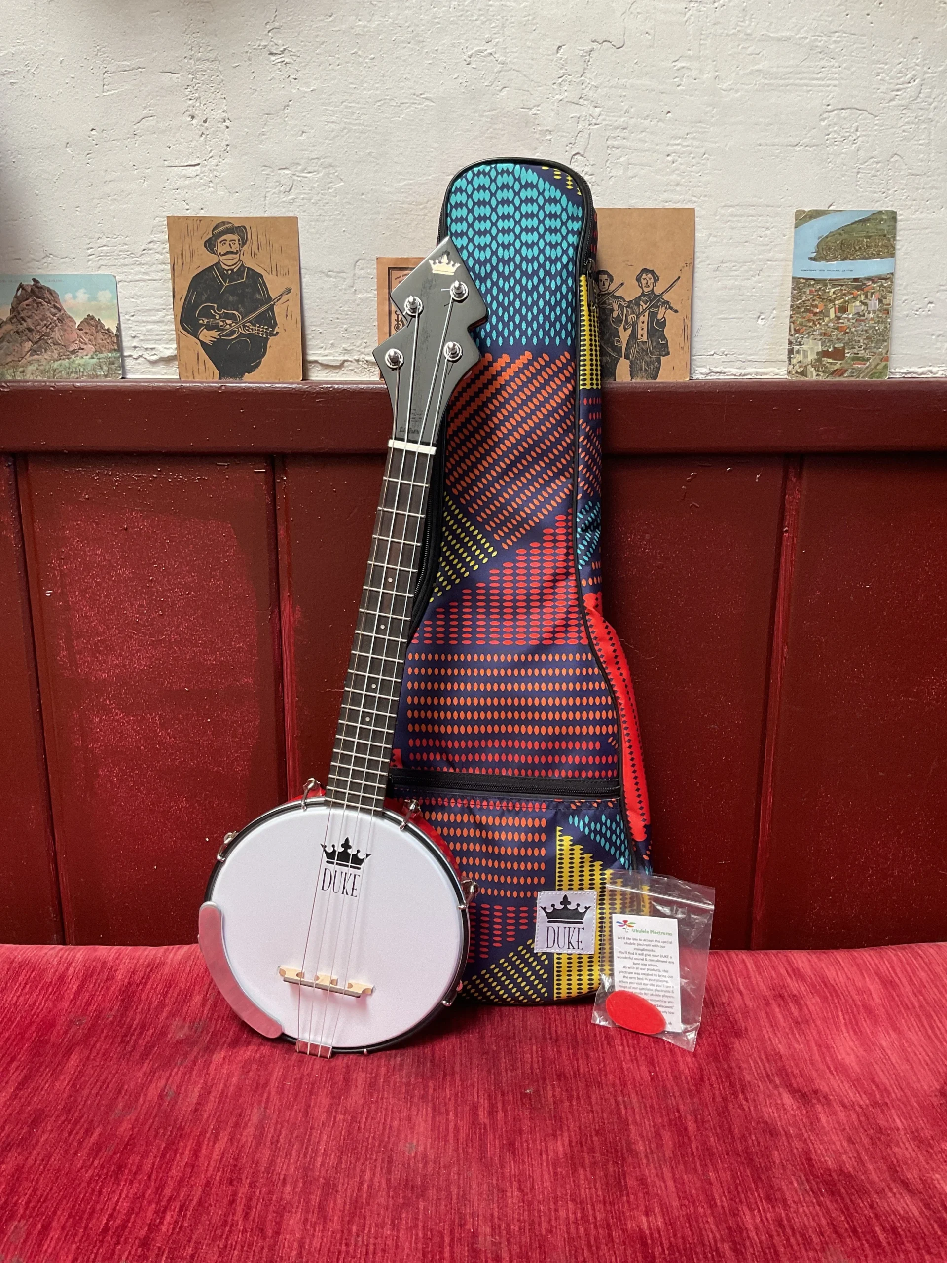 7B9C85D9-0BD9-402E-868B-A9339BEF5192.webp DUKE Tenor Banjo Ukulele (Fire Engine Red | Made in New Zealand)