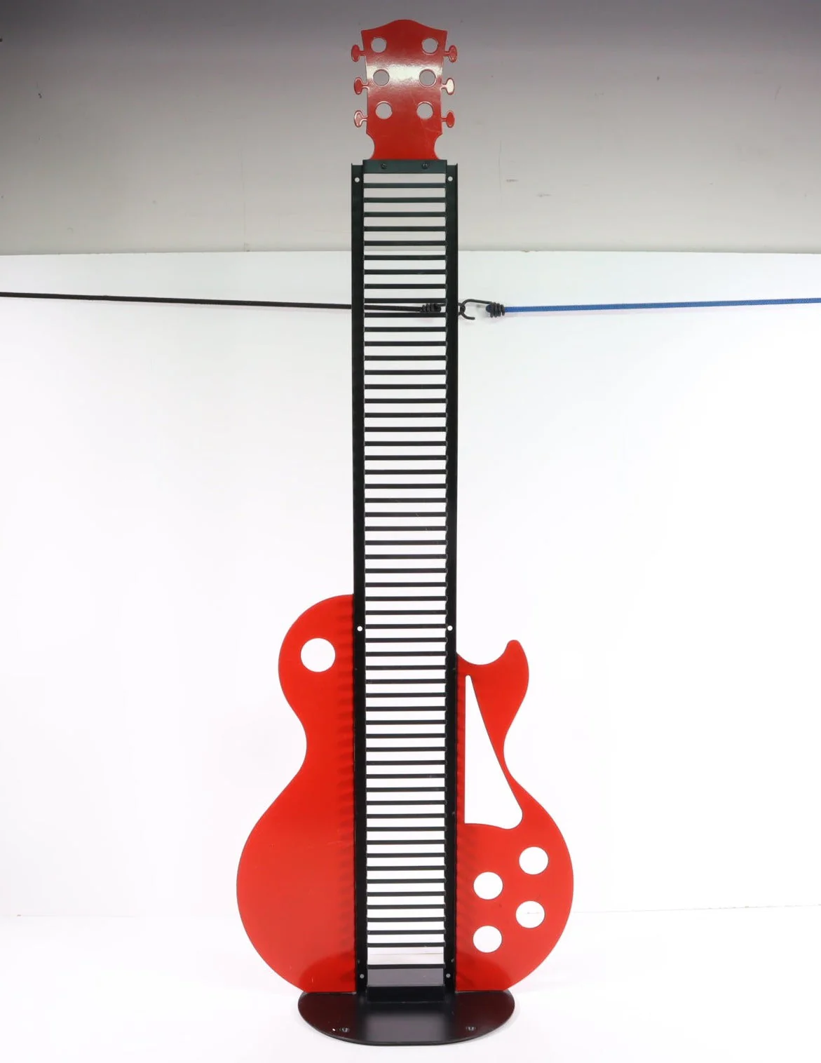 Vintage-50-Red-and-Black-Metal-Guitar-Shaped-CD-Rack-Holder-Organizer-CD-Rack_1200x1554.webp Vintage 50" Red and Black Metal Guitar Shaped CD Rack Holder Organizer