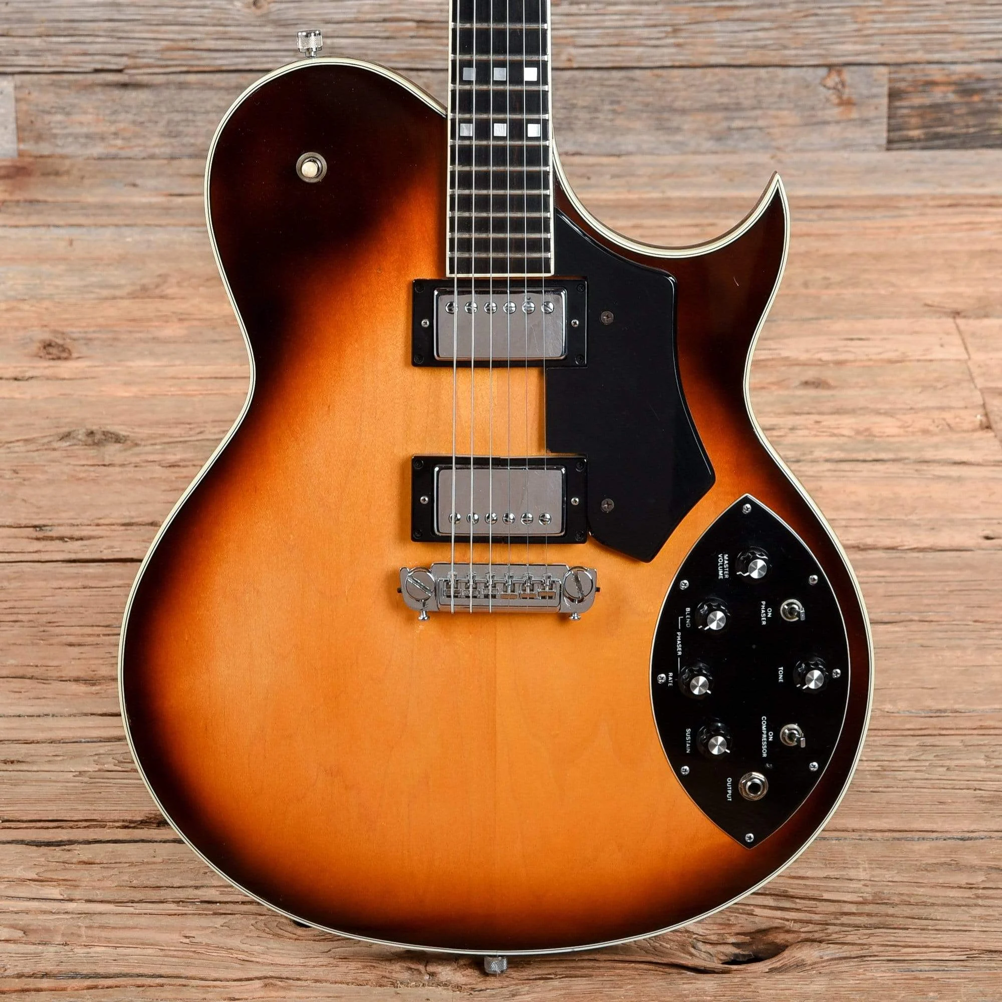 gretsch-electric-guitars-hollow-body-gretsch-chet-atkins-super-axe-sunburst-1980-cg2352640-17215223529607.webp Gretsch Chet Atkins Super Axe Sunburst 1980