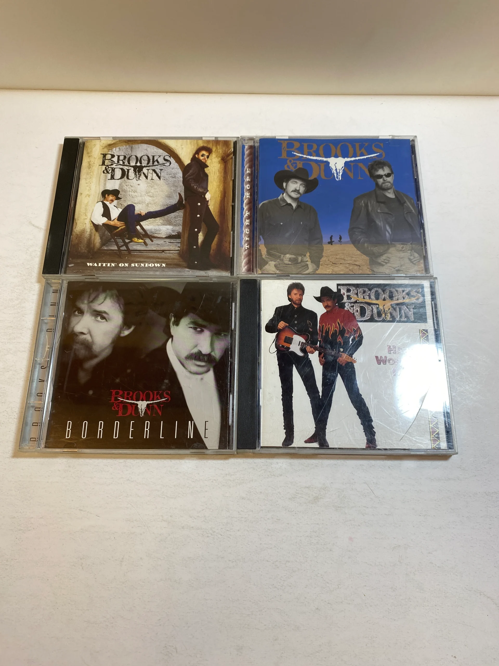 lot-of-4-brooks-and-dunn-cds-1993-1999.webp Lot of 4 Brooks and Dunn CDs 1993-1999