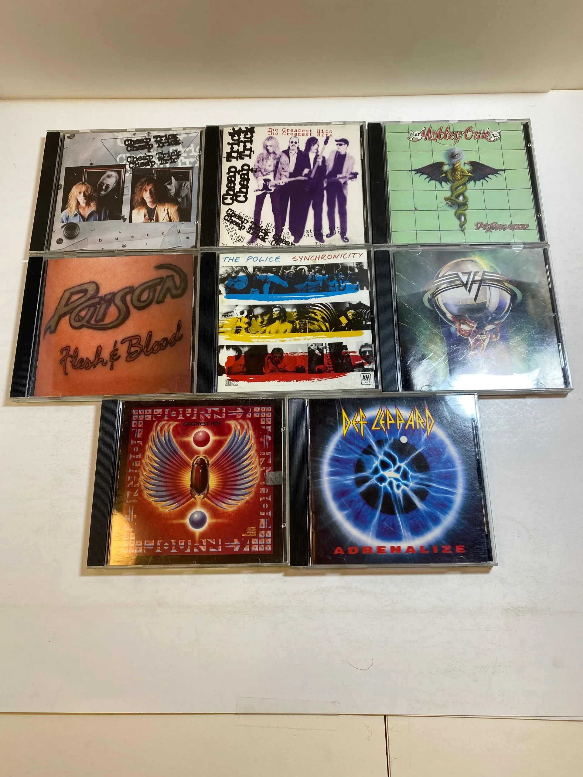 Lot of 8 1980s CDs Journey Def Leppard Poison Cheap Trick Motley Crus 1984-1992
